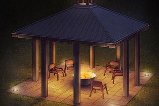 A lit gazebo at night with a fire pit surrounded by chairs.