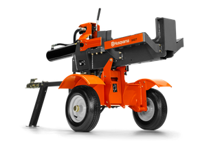 Side view of a Husqvarna log splitter with sturdy wheels and a powerful splitting mechanism.