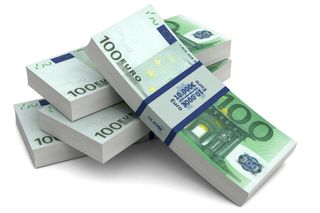 Stacks of 100 euro banknotes bundled together.