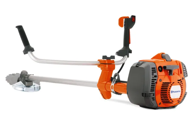 Husqvarna krūmgrieža sānu skats ar apaļu asmens stiprinājumu.