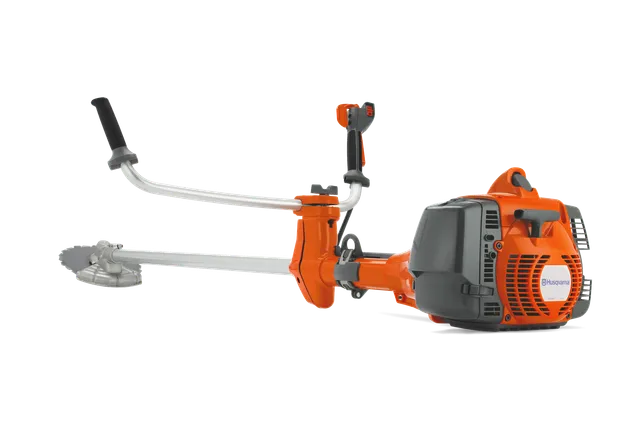 Πλάγια όψη ενός θαμνοκοπτικού Husqvarna με κυκλικό εξάρτημα λεπίδας.