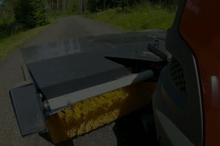 Tractor with broom 27s 16:9 MASTER