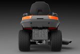 Rear view of a Husqvarna ride-on mower highlighting its robust tires and undercarriage.