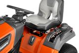 Close-up view of a Husqvarna ride-on mower seat and control panel.