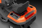 Rear view of a Husqvarna ride-on mower seat and battery compartment.