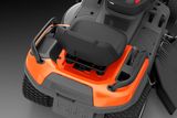 Top view of a Husqvarna ride-on mower seat and control area.