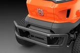 Close-up of a Husqvarna ride-on mower front bumper and wheels.