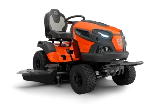 Front view of a ride-on lawn mower with visible seat and steering wheel.