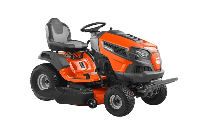 Husqvarna TS 146X. Side view of a Husqvarna ride-on lawn mower with visible cutting deck.