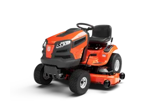 Side view of a Husqvarna ride-on lawn mower with a cutting deck.