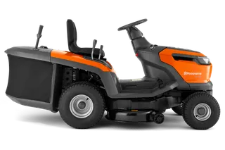 Külgvaade Husqvarna muruniidukist koos murukogujaga.