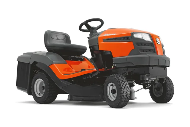 Вид збоку на газонокосарку-трактор Husqvarna з видимими стерном і сидінням.