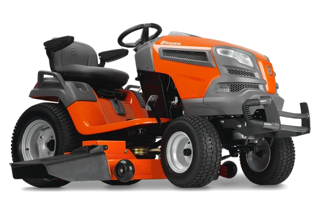 Side view of a Husqvarna ride-on lawn mower showcasing its robust design.