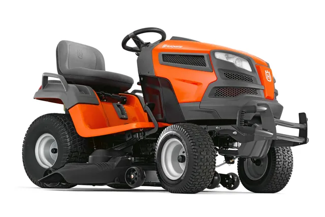 Side view of a Husqvarna ride-on mower showcasing its ergonomic design and cutting deck.
