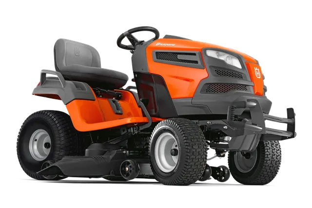 Side view of a Husqvarna ride-on lawn mower with ergonomic seat and steering wheel.