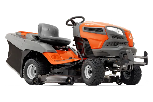 Вид збоку на косарку-трактор Husqvarna з різальною декою.