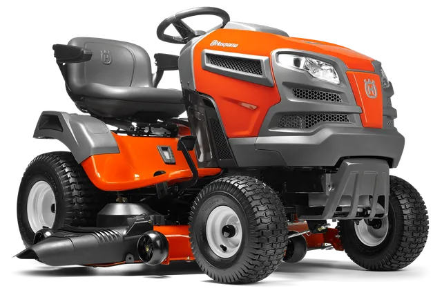 Side view of a Husqvarna ride-on mower with visible cutting deck and steering wheel.