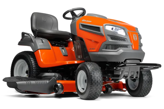 Side view of a Husqvarna ride-on lawn mower showcasing its design and features.