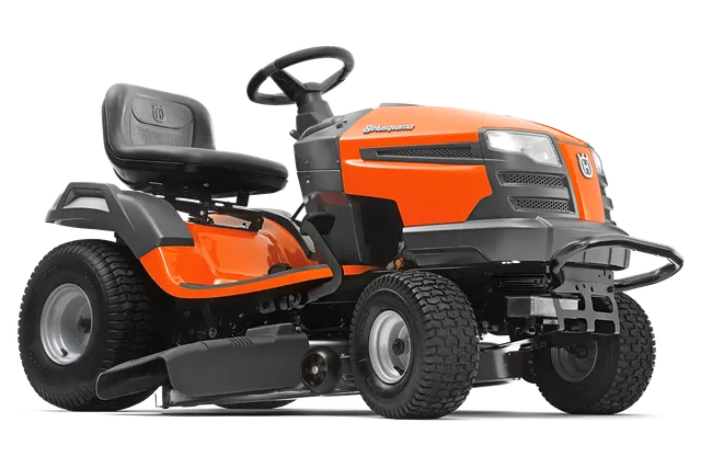 Side view of a Husqvarna ride-on lawn mower with visible steering wheel and seat.
