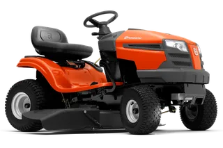 Side view of a Husqvarna ride-on lawn mower with cutting deck.