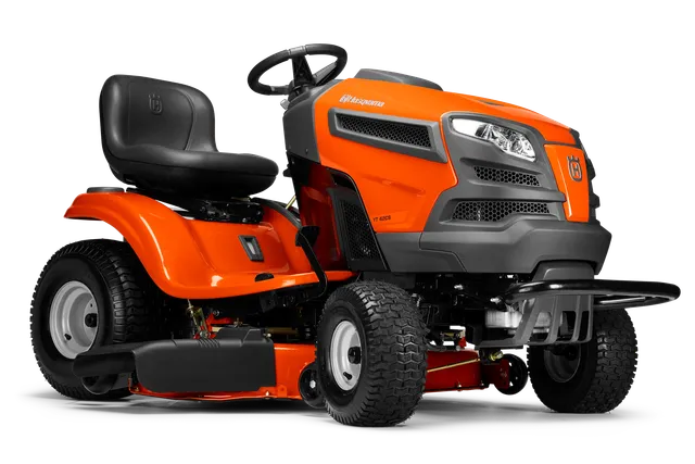 Husqvarna YT42CS. Side view of a Husqvarna ride-on lawn mower with cutting deck.