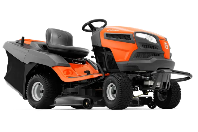 Side view of a Husqvarna ride-on mower with a cutting deck.