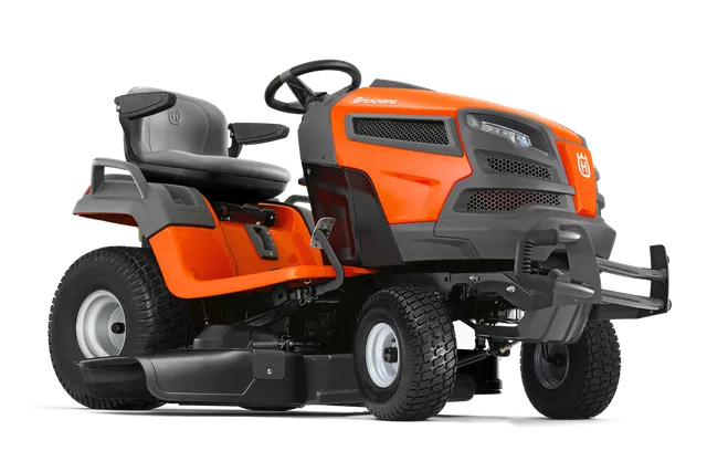 Side view of a Husqvarna ride-on mower with a comfortable seat and steering wheel.