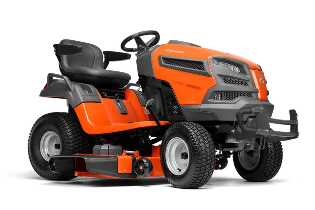 Side view of a Husqvarna ride-on mower with cutting deck.
