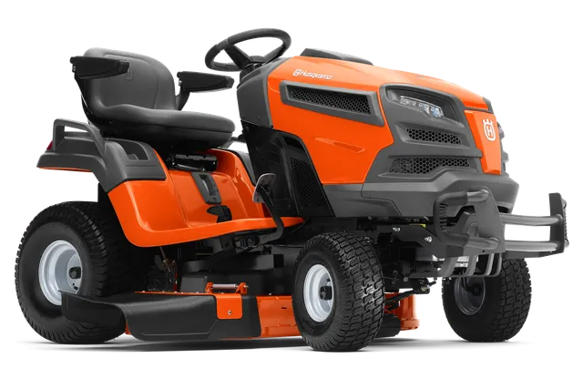 Zijaanzicht van een Husqvarna zitmaaier met het ontwerp en het maaidek.