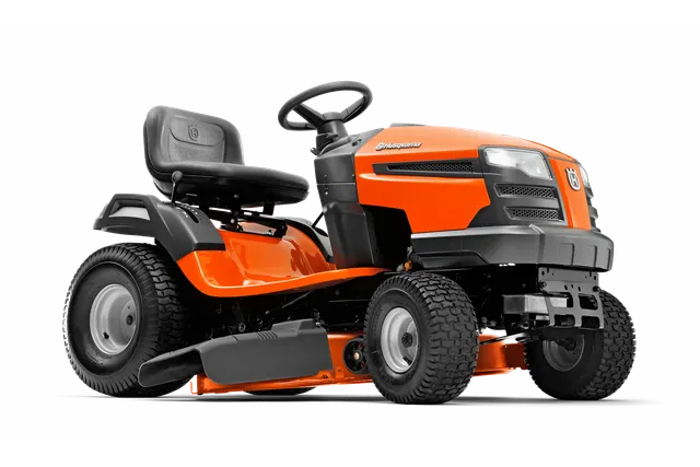Side view of a Husqvarna ride-on lawn mower with visible cutting deck.