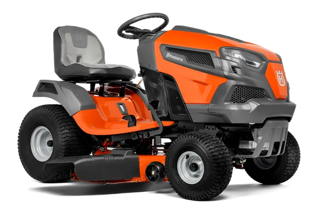 Husqvarna TS 142X. Side view of a Husqvarna ride-on lawn mower with visible cutting deck.