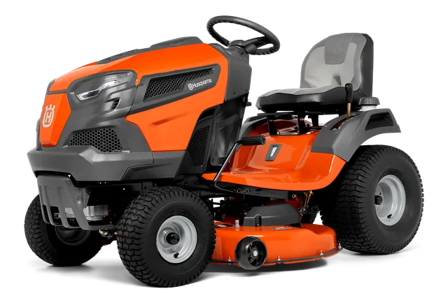 Side view of a Husqvarna ride-on lawn mower with a cutting deck.