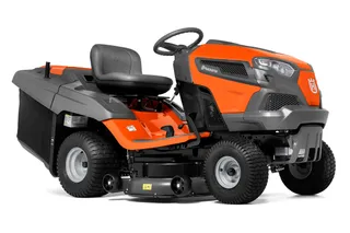 A Husqvarna felülős fűnyíró oldalnézete látható vágóasztallal.