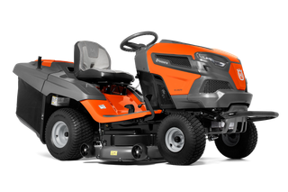 Side view of a Husqvarna ride-on lawn mower with cutting deck.