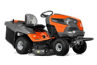 Side view of a Husqvarna ride-on lawn mower with cutting deck.
