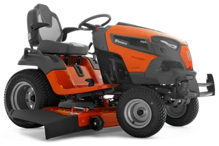 Side view of a Husqvarna ride-on mower with cutting deck.