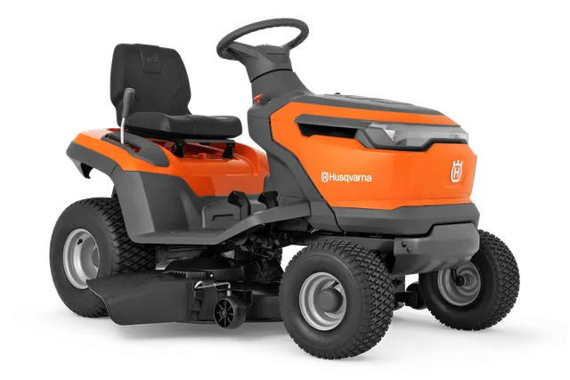 Side view of a Husqvarna ride-on lawn mower with visible cutting deck.