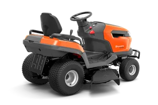 Rear view of a ride-on lawn mower with visible steering wheel and seat.