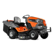 Side view of a Husqvarna ride-on lawn mower with visible cutting deck.