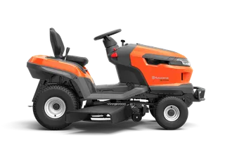 Side view of a ride-on lawn mower with cutting deck.