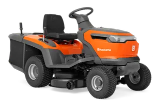 Side view of a Husqvarna ride-on lawn mower with cutting deck.