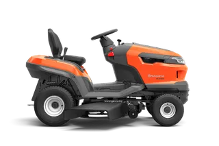 Side view of a Husqvarna ride-on mower with a visible steering wheel and seat.