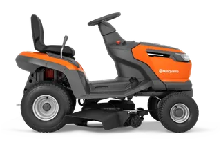 Side view of a Husqvarna ride-on lawn mower.