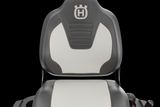 Rear view of a Husqvarna ride-on mower seat with branding visible.