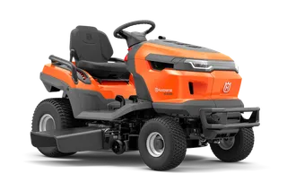 Side view of a Husqvarna ride-on mower with visible seat and steering wheel.
