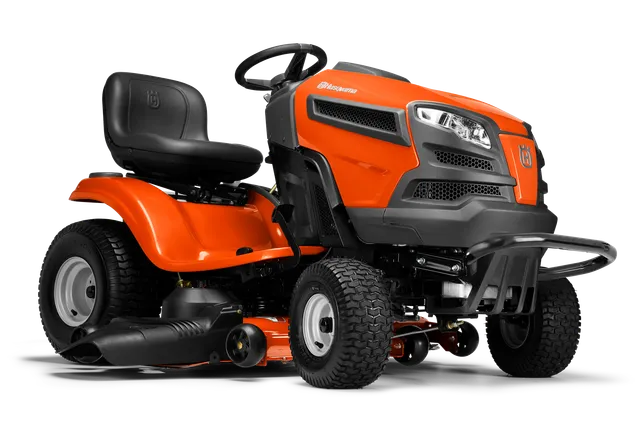 Side view of a Husqvarna ride-on lawn mower showcasing its design and features.
