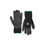 Pár pracovných rukavíc Husqvarna s logom, vystavené naplocho.