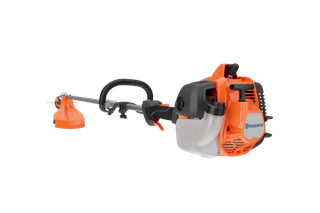 Side view of a Husqvarna grass trimmer with visible engine and cutting head.