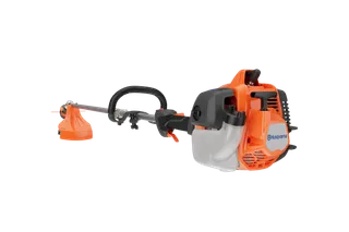 Husqvarna 330LK. Side view of a Husqvarna grass trimmer with visible engine and cutting head.