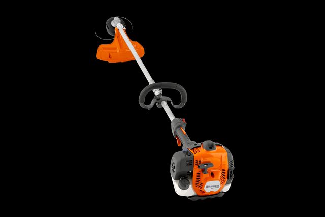 Side view of a Husqvarna combi trimmer with visible cutting head and handle.
